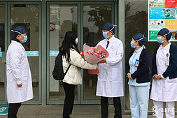 Another patient discharged from the hospital in Shanghai